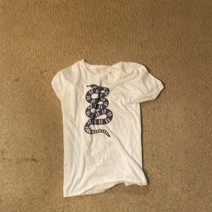 White shirt with purple snake